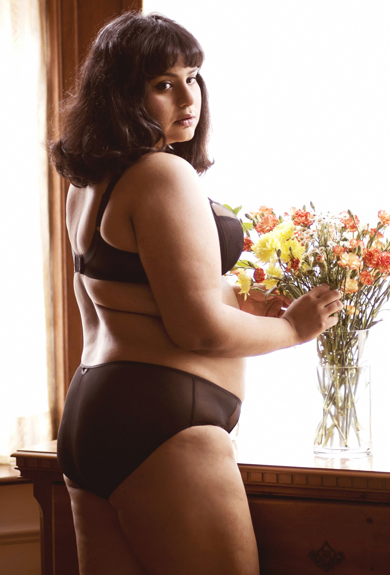 Red hot and sleek black: two plus size lingerie looks.
